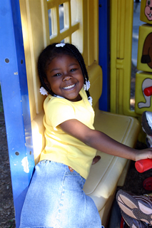 girl playing on playground 